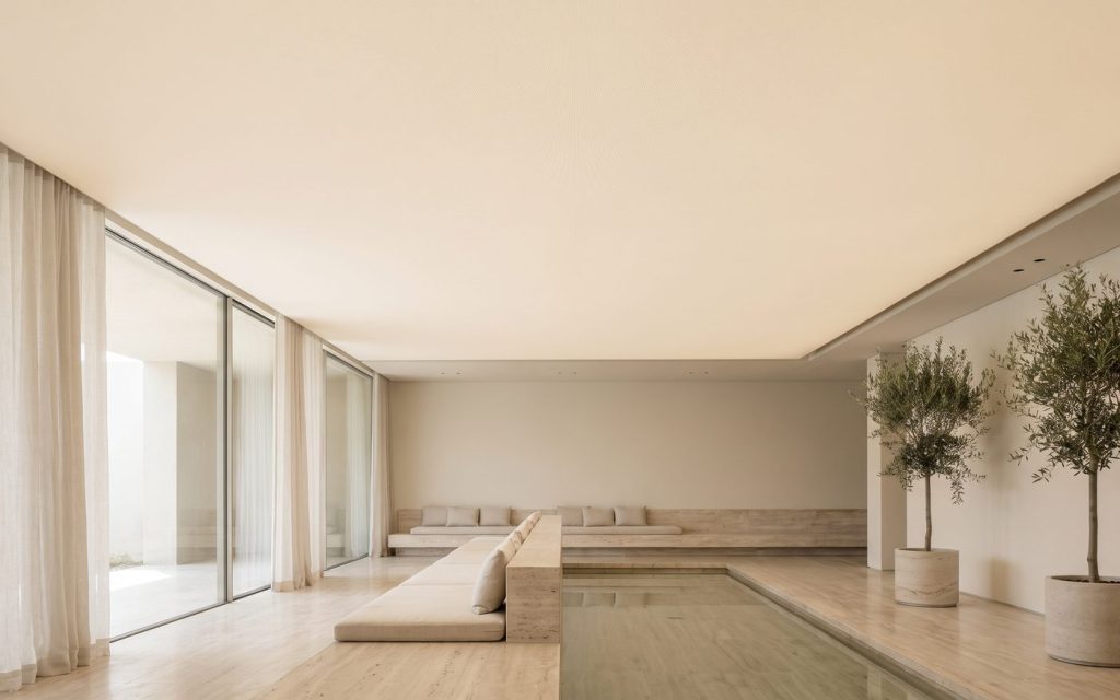 Seamless CLIPSO knit fabric ceiling spanning a daylit spa relaxation room